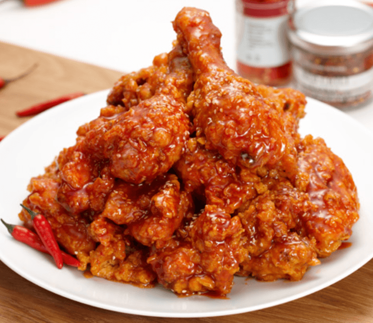 Korean fried chicken (kfc) with spicy and sweet sauce